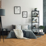 Inhaus Manor Hemingway 64916 herringbone laminate room scene